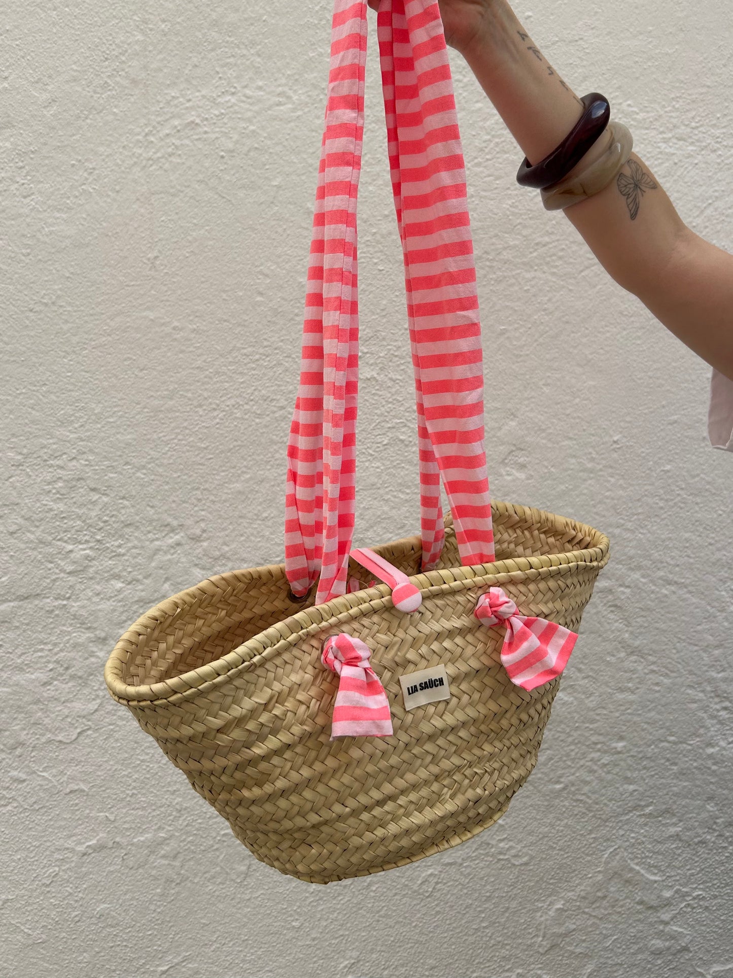 Capazo mediano rosa flúor